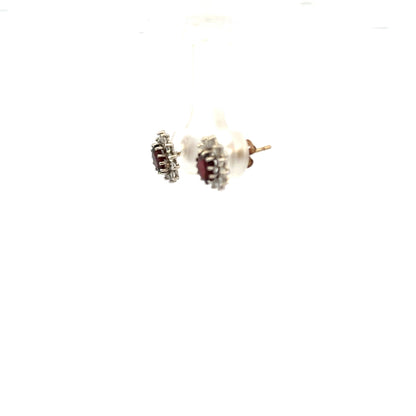 9ct yellow gold earrings with a simple design, weighing 1.2 grams, shown in this image. Unbranded jewelry accessory.