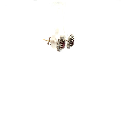 9ct yellow gold earrings weighing 1.2g, unbranded, with a classic design, shown in a close-up image.