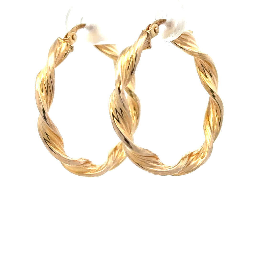 9ct yellow gold earrings weighing 1.6g, featuring a classic design, showcased on a neutral background.