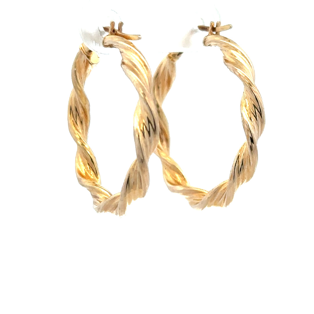 9ct yellow gold earrings, unbranded, with a sleek design, weighing 1.6 grams, shown on a neutral background.