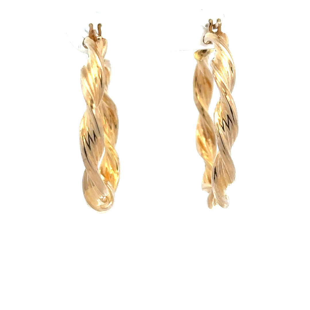 9ct yellow gold earrings weighing 1.6g, simple classic design, unbranded jewelry with a polished finish.