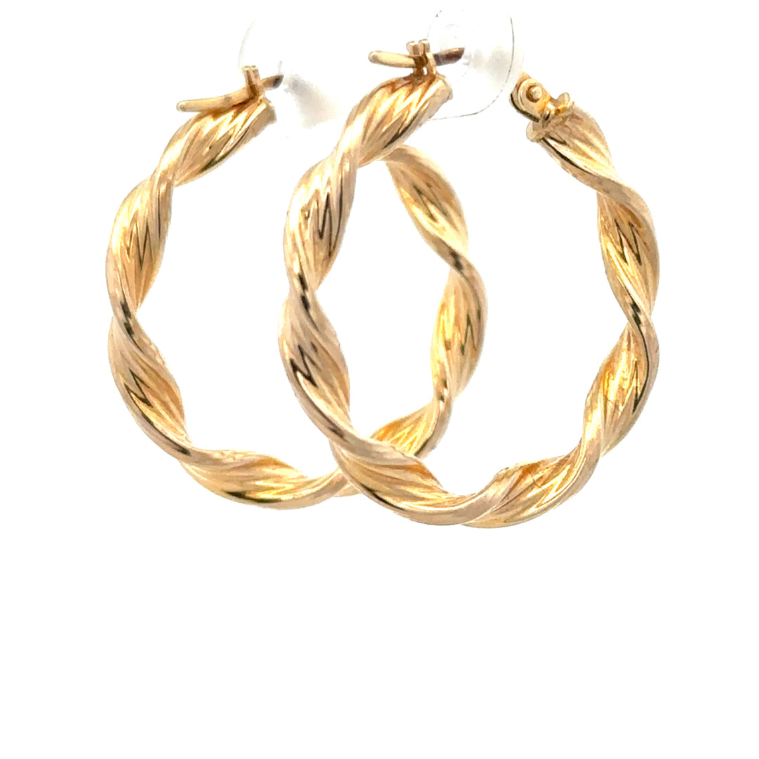 9ct yellow gold earrings with a simple design, weighing 1.6g, featuring a classic style suitable for everyday wear.