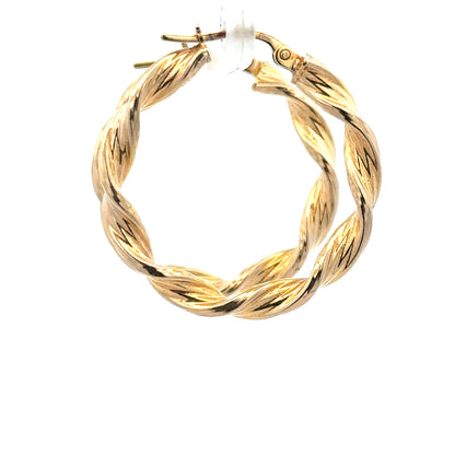 9ct yellow gold earrings with a simple, elegant design, weighing 1.6 grams, displayed on a neutral background.
