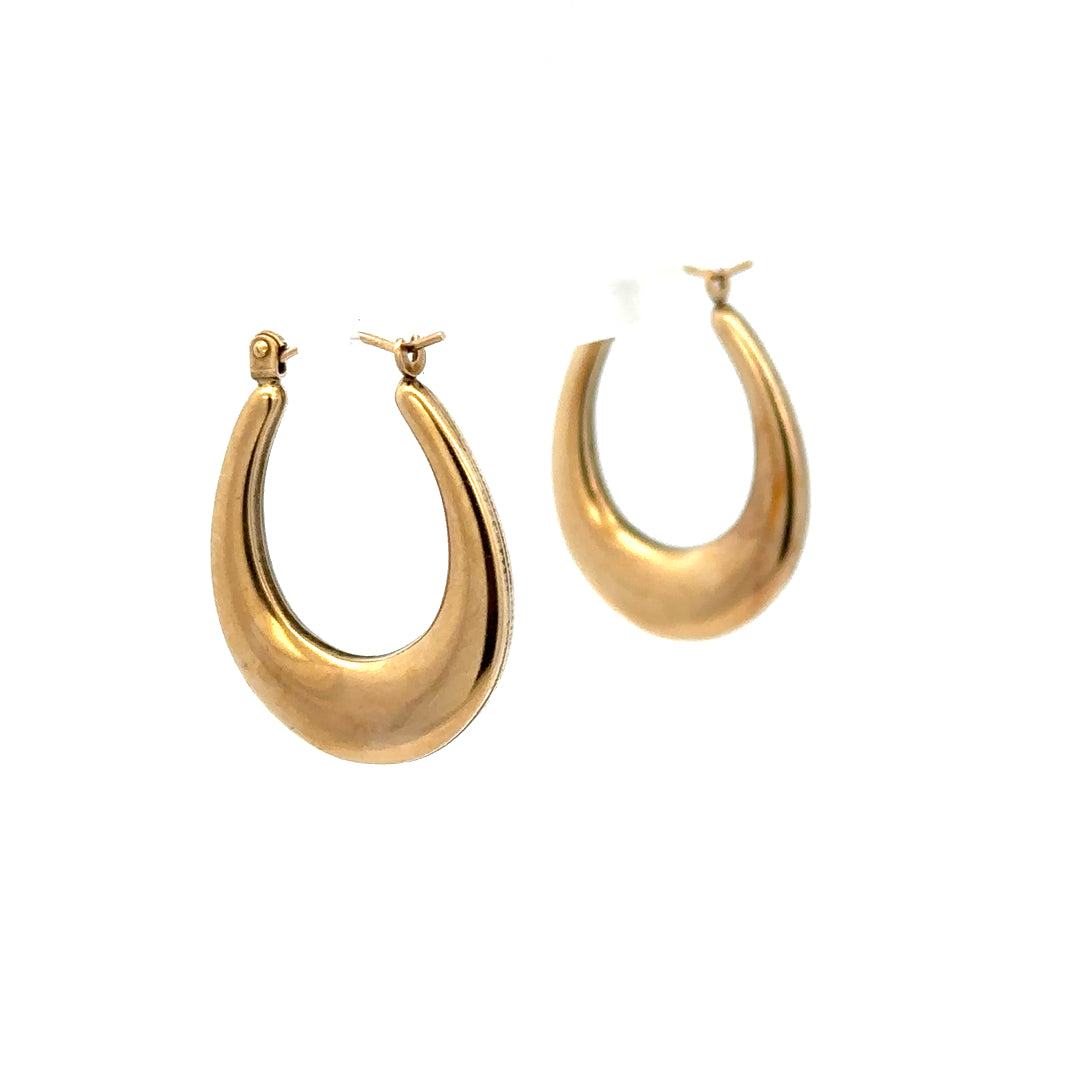 9ct yellow gold earrings weighing 1.8g, stylish unbranded earrings with a polished finish, displayed in a close-up image.