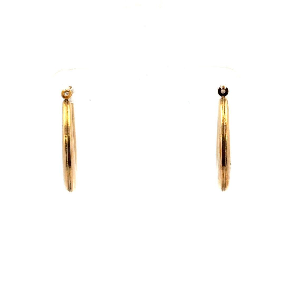 9ct yellow gold earrings, unbranded, 1.8g, featuring a classic design, shown resting on a neutral background.