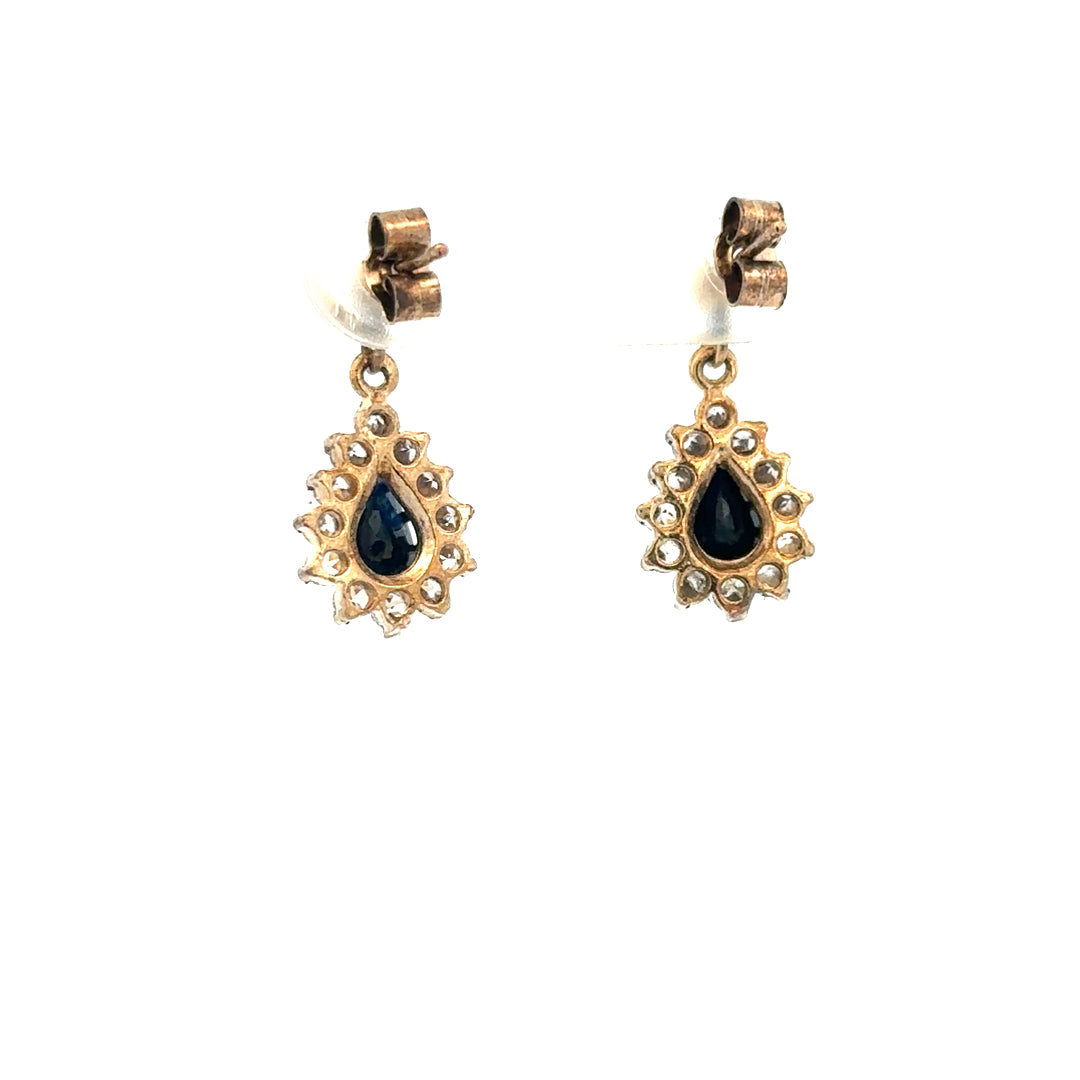 9ct yellow gold earrings weighing 1.8g, featuring a classic design, unbranded, shown in a detailed close-up image.