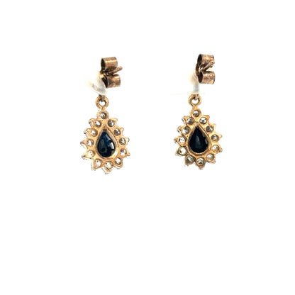 9ct yellow gold earrings weighing 1.8g, featuring a classic design, unbranded, shown in a detailed close-up image.
