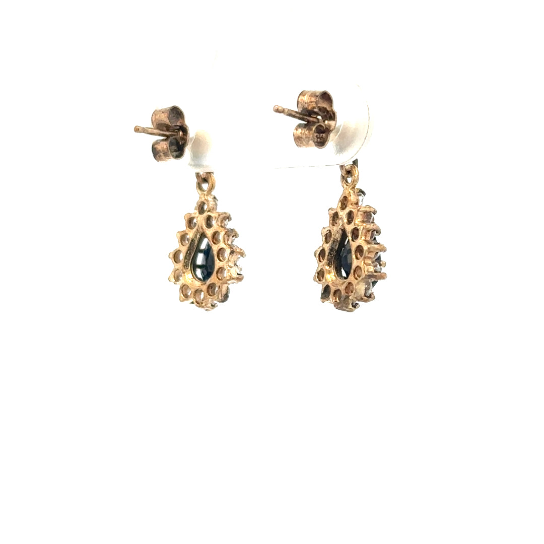 9ct yellow gold earrings with a simple design, weighing 1.8g, displayed against a neutral background.