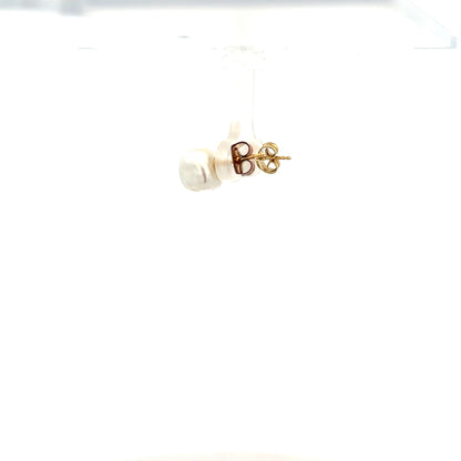 9ct yellow gold earrings weighing 2.6g, shown in a close-up image highlighting their classic design and polished finish.