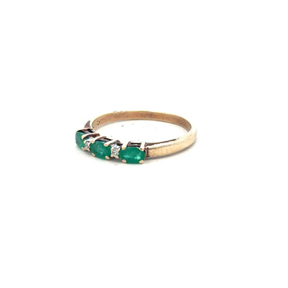 9ct yellow gold ring with emerald and diamond accents, size T, featuring intricate design and sparkling gemstones.