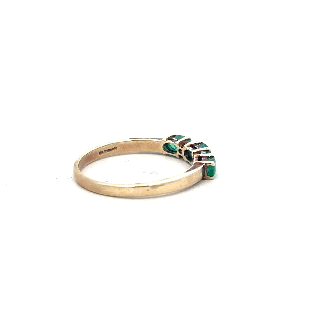 9ct yellow gold emerald and diamond ring in size T with intricate design, showcasing sparkling gemstones and polished gold finish.