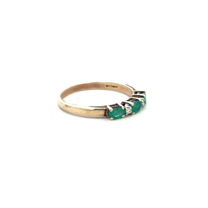 9ct yellow gold emerald and diamond ring in size T, featuring a vibrant emerald centerpiece with sparkling diamonds.