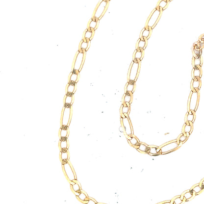 9ct yellow gold figaro bracelet with a delicate chain design, weighing 1.5g, unbranded jewelry accessory.
