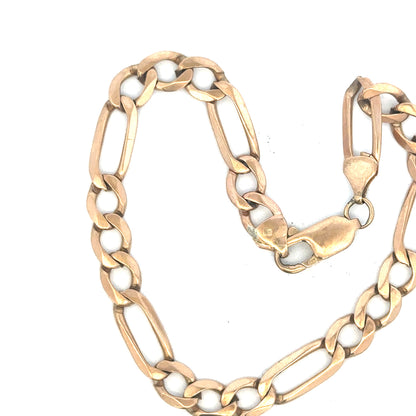 9ct yellow gold figaro bracelet, unbranded, showcasing linked chain design and polished finish, weight 11.9g.