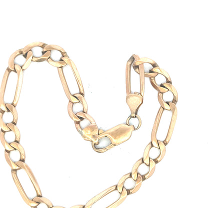 9ct yellow gold figaro bracelet, unbranded, showcasing linked chain design with 11.9g weight on a plain background