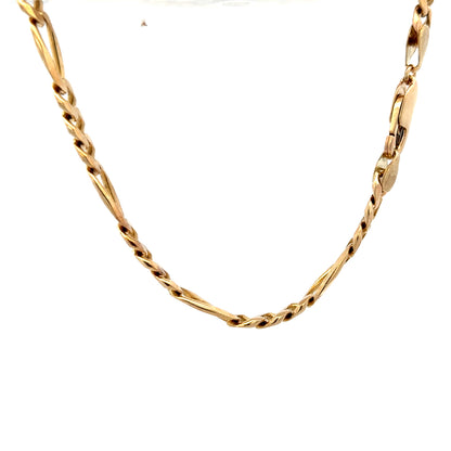 9ct yellow gold Figaro bracelet weighing 13.8g, unbranded, with detailed chain links, shown in a close-up image.