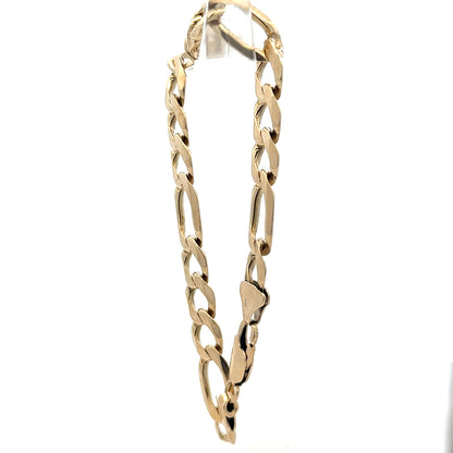 9ct yellow gold figaro bracelet with a 20.1g weight, featuring classic chain links and a polished finish.
