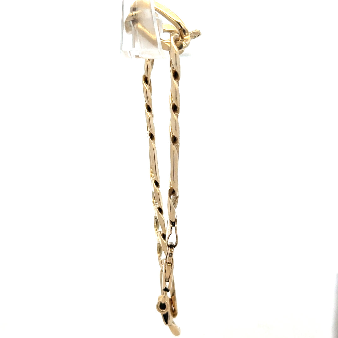 9ct yellow gold Figaro bracelet with a polished chain design, weighs 20.1 grams, unbranded jewelry accessory.