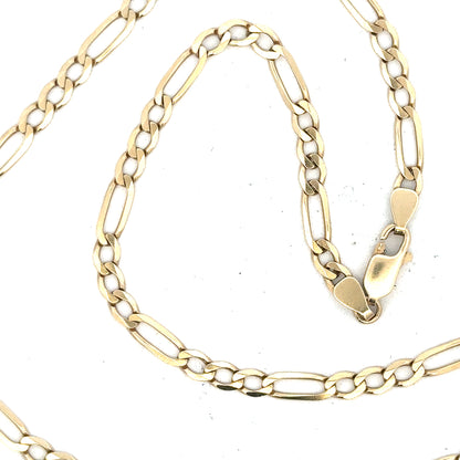 9ct yellow gold figaro chain, unbranded, weight 11g, showcasing the intricate linked design and shiny finish.