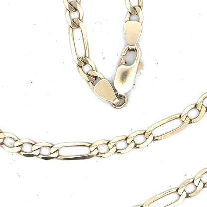 9ct yellow gold figaro chain weighing 11g, showcasing its linked design and shiny finish.