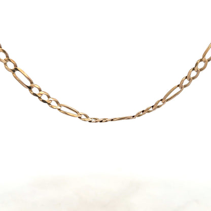 9ct yellow gold Figaro chain, unbranded, with a shiny finish and linked design, weighing 25.9 grams.