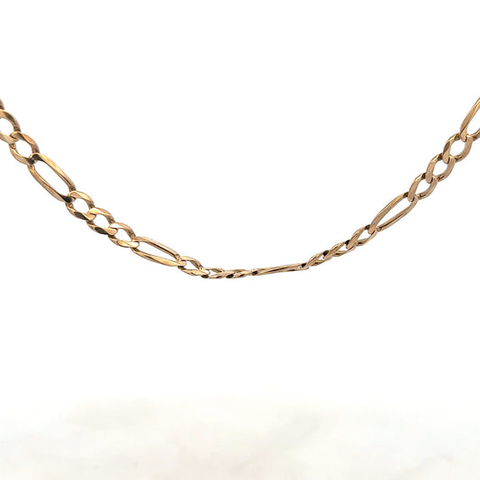 9ct yellow gold Figaro chain, unbranded, with a shiny finish and linked design, weighing 25.9 grams.