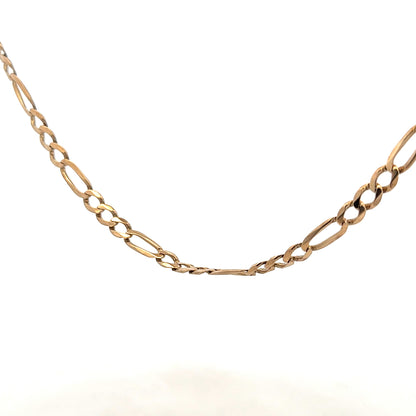 9ct yellow gold figaro chain weighing 25.9g, showcasing its linked design and polished finish.