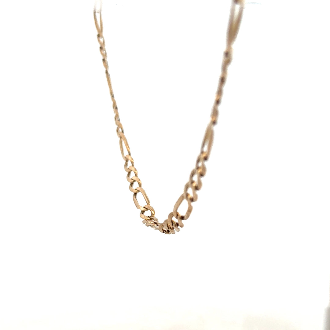 9ct yellow gold Figaro chain with a detailed link design, weighing 25.9g, showcasing a luxurious jewelry piece.