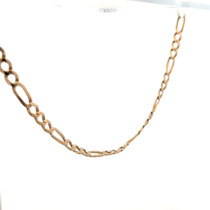 9ct yellow gold Figaro chain, unbranded, with a polished finish, weighs 25.9g, displayed on a plain background.
