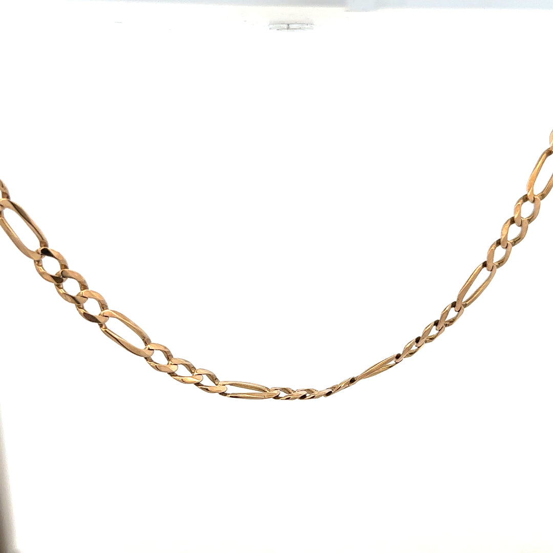 9ct yellow gold Figaro chain with a polished finish, weighing 25.9g, featuring distinctive interlinked links.