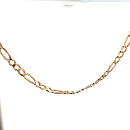 9ct yellow gold Figaro chain with a polished finish, weighing 25.9g, featuring distinctive interlinked links.