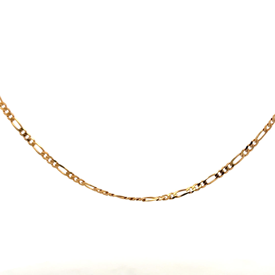 9ct yellow gold Figaro chain with a polished finish, weighing 3.7g, showcasing its intricate linked design.