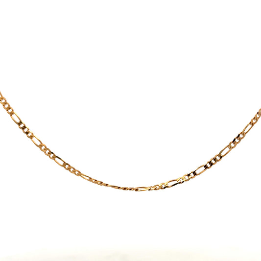 9ct yellow gold Figaro chain with a polished finish, weighing 3.7g, showcasing its intricate linked design.
