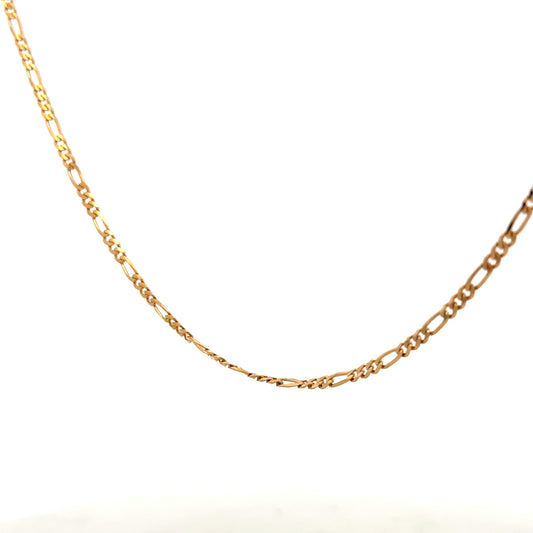 9ct yellow gold figaro chain, unbranded, with detailed links, weighing 3.7g, shown against a neutral background.