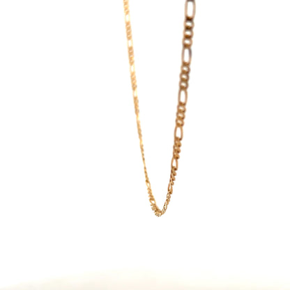 9ct yellow gold figaro chain weighing 3.7g, unbranded, showing the detailed links and polished finish.