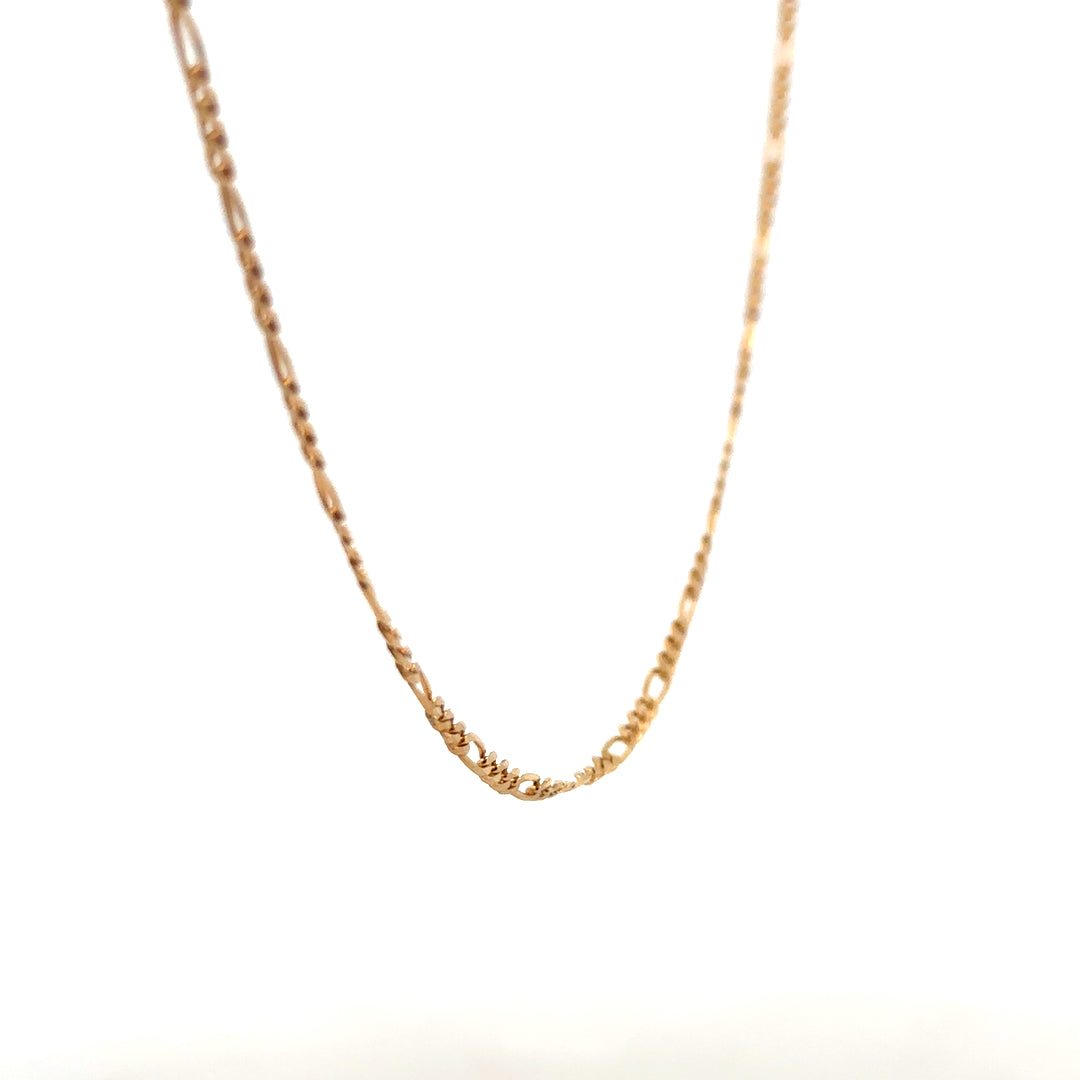 9ct yellow gold figaro chain weighing 3.7g, unbranded jewelry with polished links, close-up of the chain's detailed design.