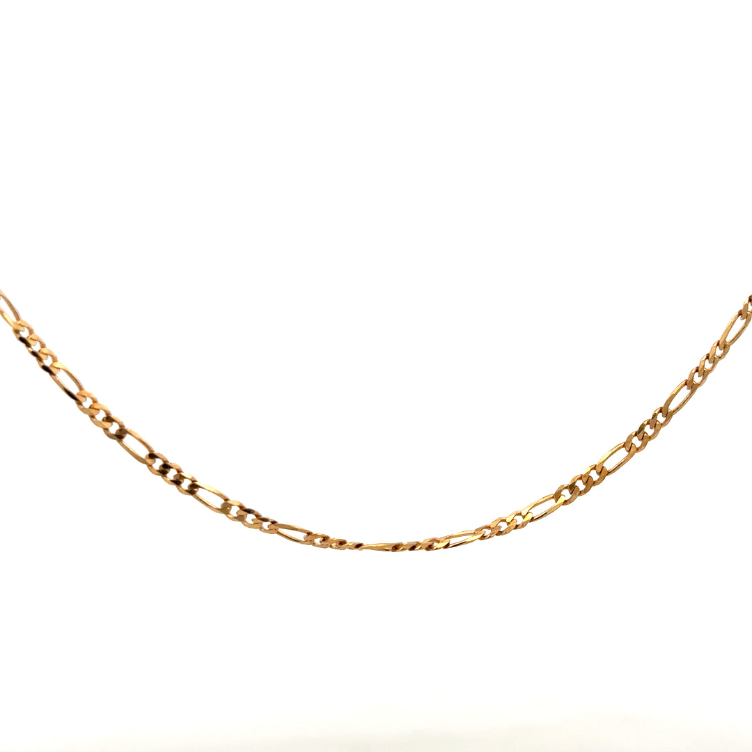 9ct yellow gold Figaro chain, unbranded, showcasing polished links and elegant design, weighs 3.7 grams.