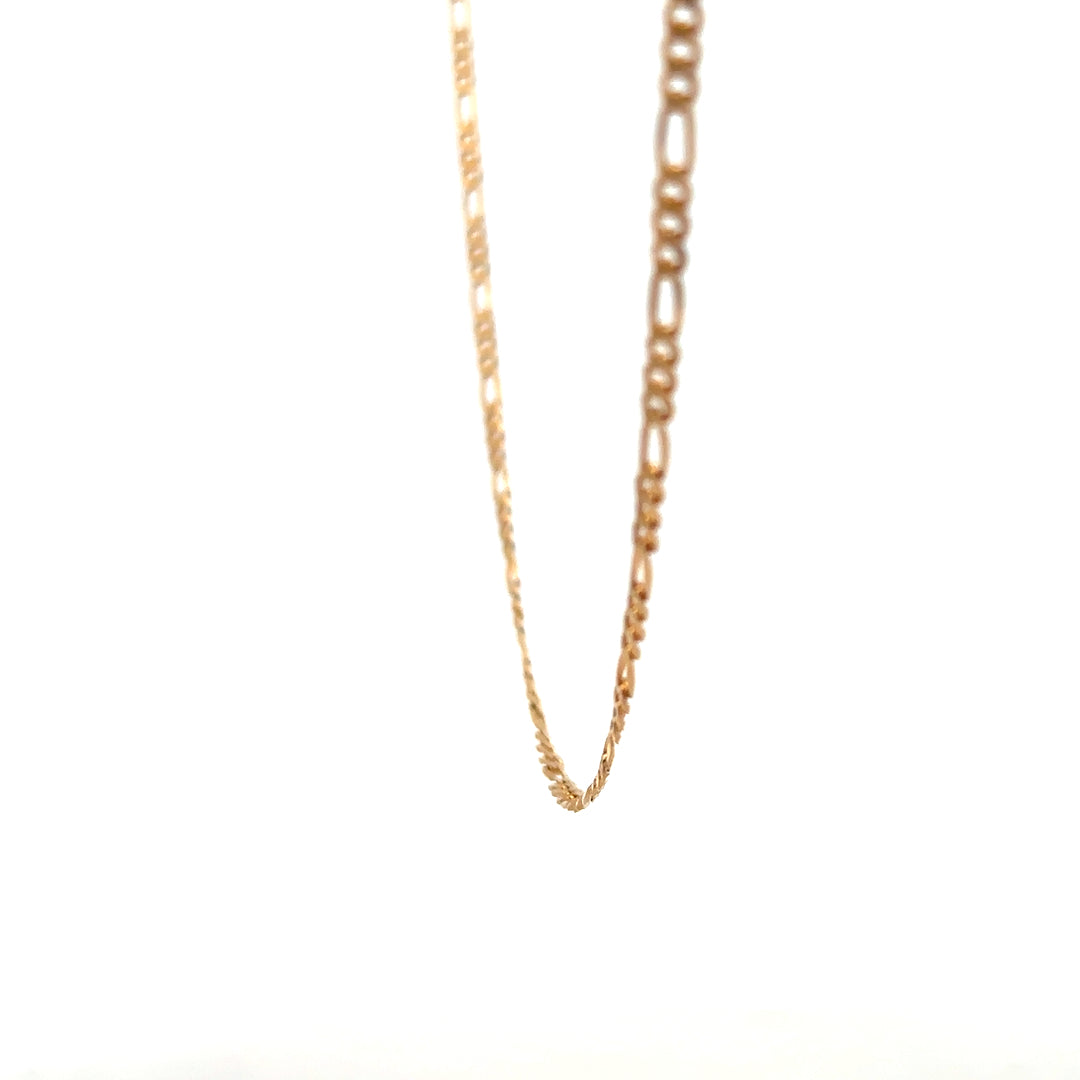9ct yellow gold figaro chain with detailed links, weighing 3.7g, unbranded jewelry chain for men or women.