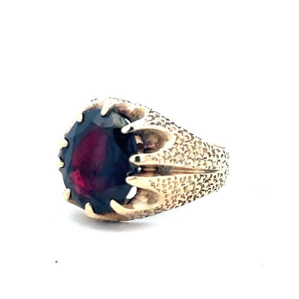 9ct yellow gold garnet ring in size N1/2 with a vibrant red garnet gemstone, featuring a classic gold band design.