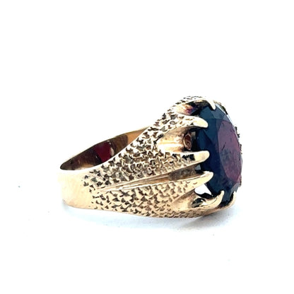 9ct yellow gold garnet ring in size N1/2 featuring a vibrant garnet gemstone set in a polished gold band.
