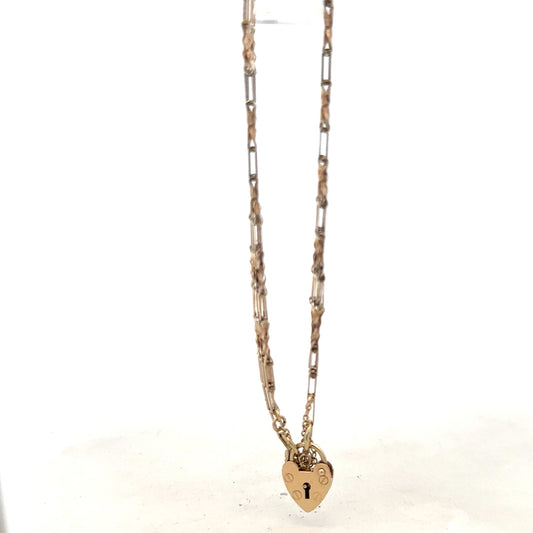 9ct yellow gold gate bracelet with a polished finish, weighing 5.8g, featuring a secure clasp and classic design.