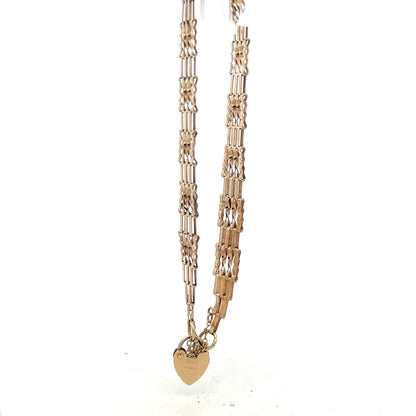 9ct yellow gold gate bracelet weighing 5.8g, unbranded jewelry piece with a classic link design.