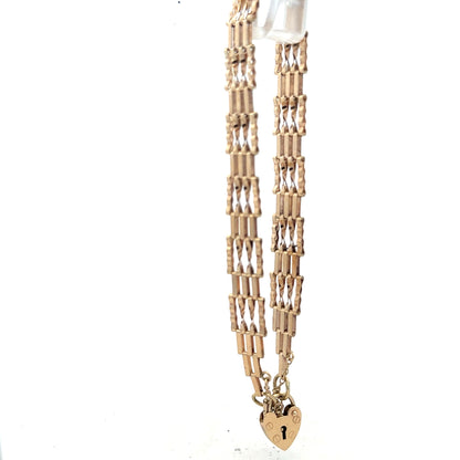 9ct yellow gold gate bracelet with a polished finish, weighing 5.8g, unbranded jewelry accessory, shown on a plain background