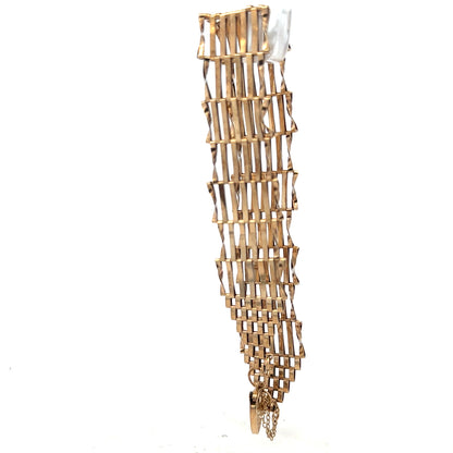9ct yellow gold gate bracelet with a simple link design, weighing 7.4g, unbranded jewelry accessory.