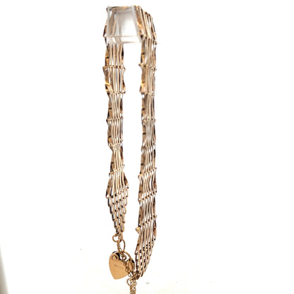9ct yellow gold gate bracelet with a polished finish, weighs 7.4g, featuring a classic chain link design.