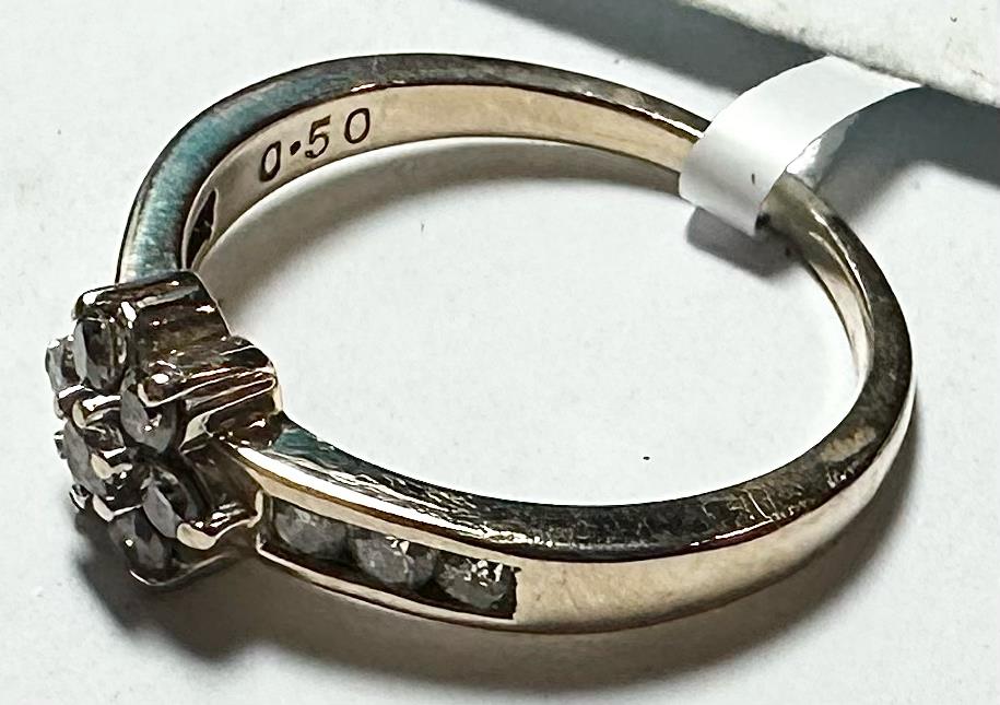 9ct yellow gold half-caret diamond ring in size M with sparkling diamonds, elegant jewelry piece for women.