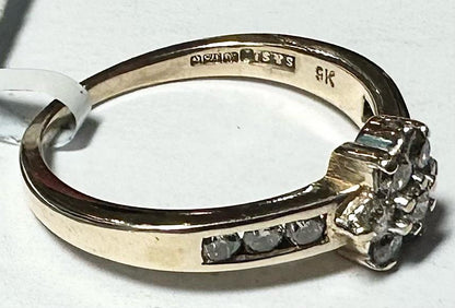 9ct yellow gold half-carat diamond ring in size M, featuring sparkling diamonds and a sleek band design.