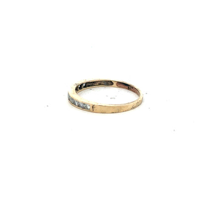 9ct yellow gold half eternity diamond ring in size N, featuring a row of sparkling diamonds around the band.