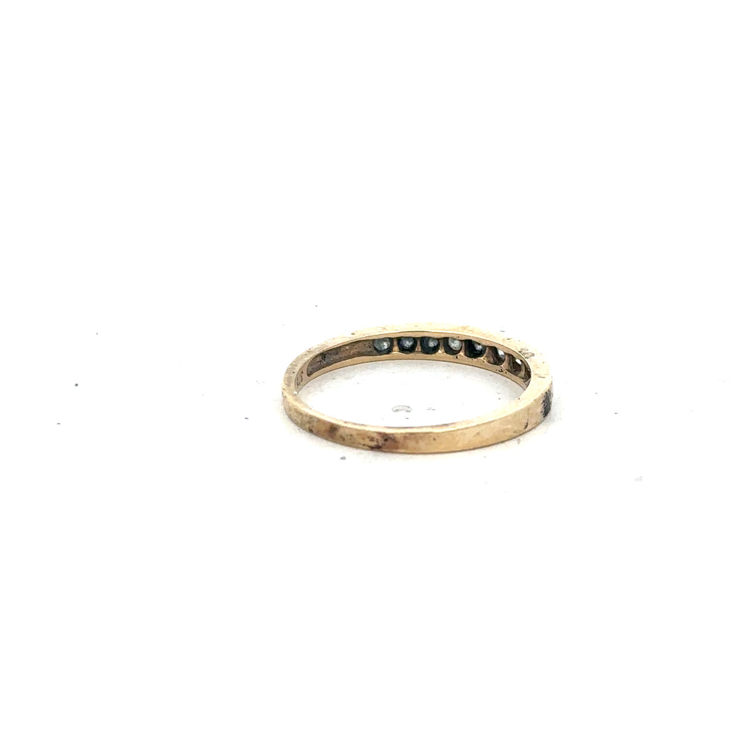 9ct yellow gold half eternity diamond ring in size N featuring a row of sparkling diamonds on a sleek band.
