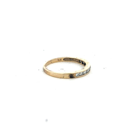 9ct yellow gold half eternity diamond ring in size N featuring a row of sparkling diamonds on a sleek band